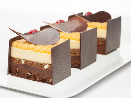 cakes on white dish & white backgroundの写真素材