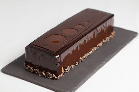 cakes on black dish & white backgroundの写真素材