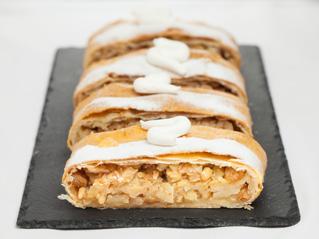 cakes on black dish & white backgroundの写真素材