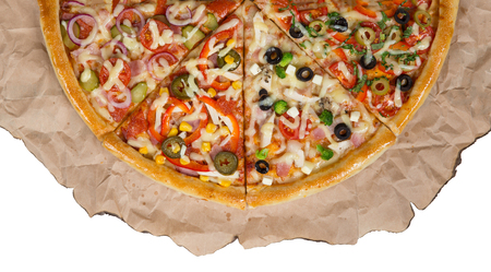 Assorted pizzas on paper on a white background isolated.の写真素材