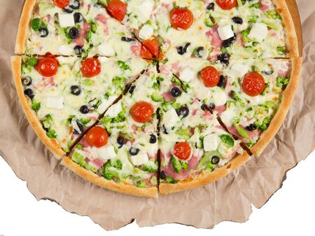 Slices of pizza on paper on a white background isolatedの写真素材