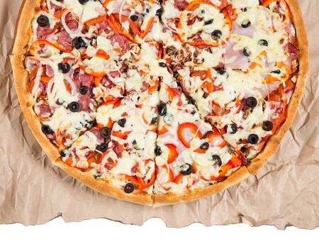 Slices of pizza on paper on a white background isolatedの写真素材