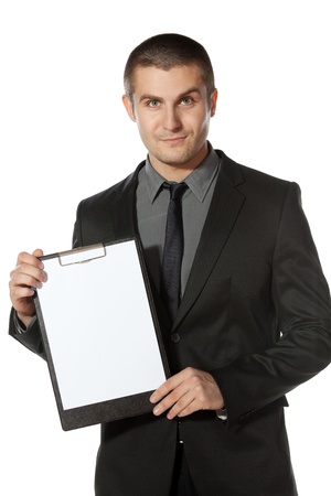 Young businessman holding blank board, isolated on white backgroundの写真素材