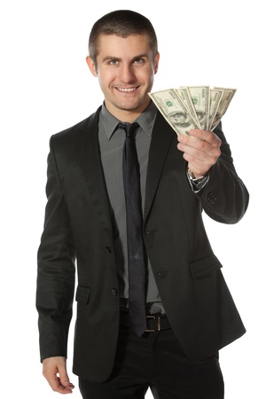 Young business man offering pack of Euro money over white backgroundの写真素材