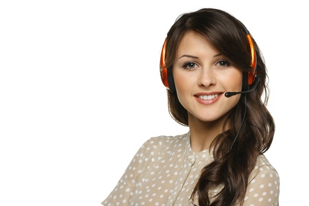Smiling cheerful support phone operator woman in headset, isolated on white backgroundの写真素材