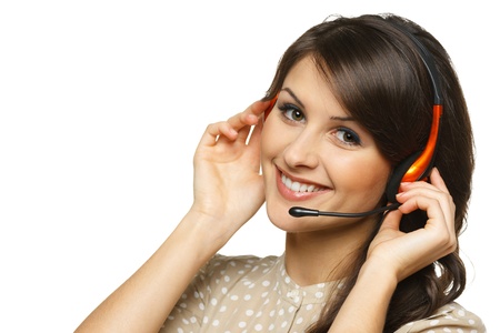 Smiling cheerful support phone operator woman in headset, isolated on white backgroundの写真素材
