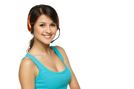 Smiling cheerful support phone operator woman in headset, isolated on white backgroundの写真素材