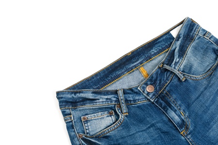 Cropped picture of blue jeans  over white backgroundの写真素材