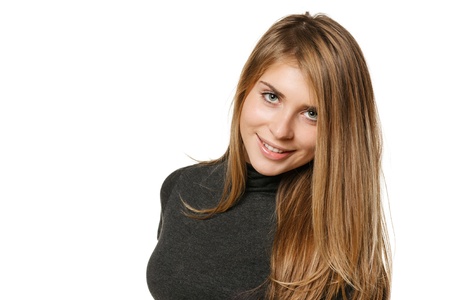 Closeup of young smiling natural female, over white backgroundの写真素材