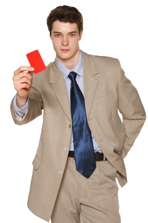 Young business man giving you a blank credit card, focus on the cardの写真素材