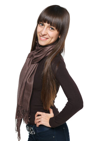 Casual smiling brunette female in scarfの写真素材
