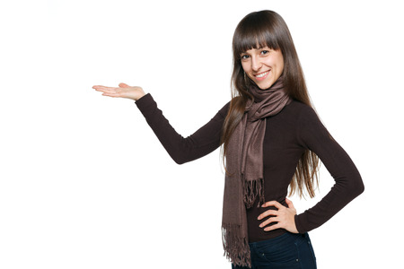 Woman holding blank copy space on her open palmの写真素材