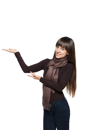 Woman showing blank copy space aboveの写真素材