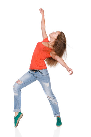 Woman hip hop dancer over white backgroundの写真素材