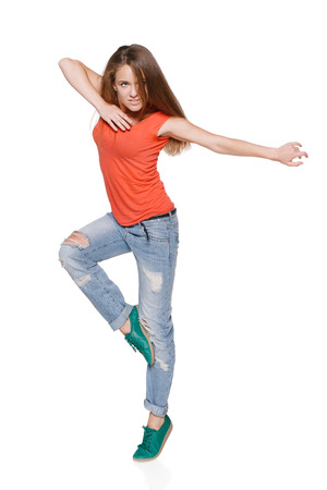 Woman hip hop dancer over white backgroundの写真素材