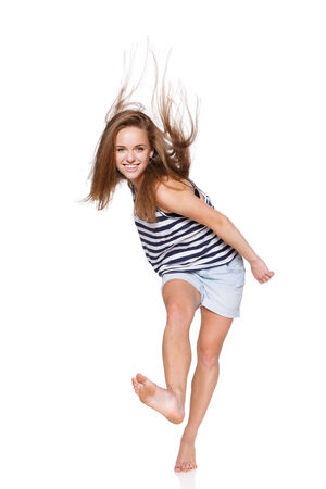 Woman hip hop dancer over white backgroundの写真素材