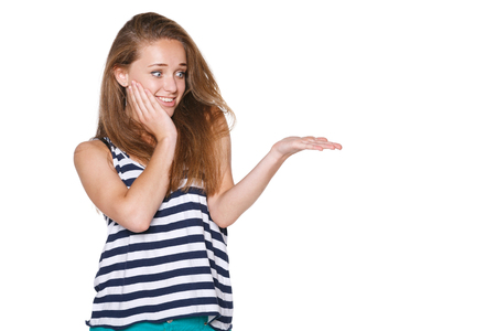 Surprised woman showing open hand palm with copy space for product or textの写真素材