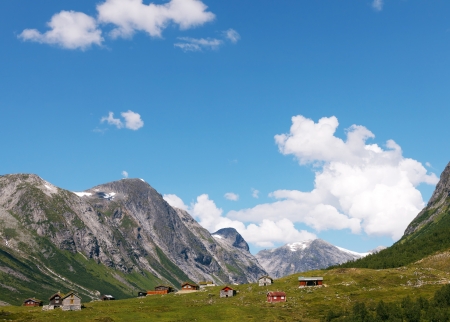 Small village in a valley in mountains, Norwayの写真素材