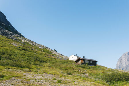 Summer houses in mountains, in Jotunheimen national park, Norwayの写真素材