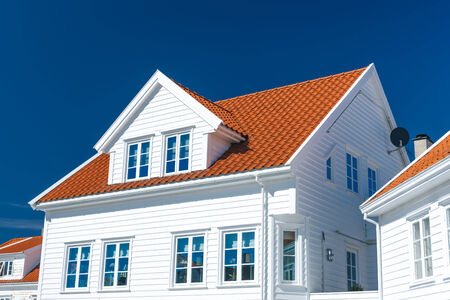 Traditional white wooden house in Norway, summer dayの写真素材