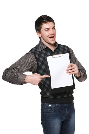 Excited man with blank board pointing at itの写真素材