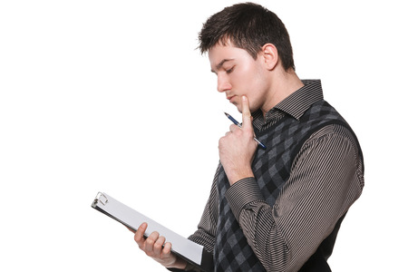 Busy thinking businessman making notes, planning conceptの写真素材