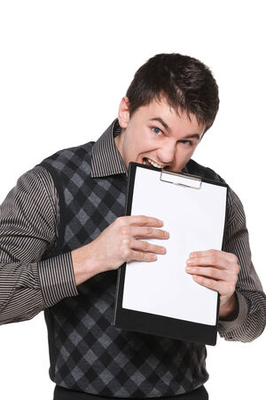 Excited man biting blank board, against white backgroundの写真素材