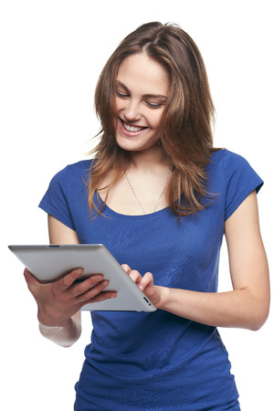 Tablet computer  Woman using digital tablet isolated on white background の写真素材