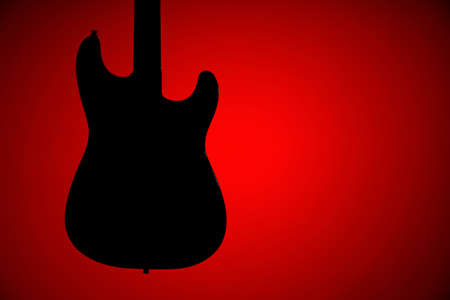 Silhouette of black electric guitar on red background, low key with backlightの写真素材