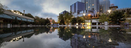 Odessa, Ukraine - April 03 2020: Modern night mall in Odessa of Arñadia, with reflection on water surface. Concept: nightlife, relaxation in the modern resortのeditorial素材