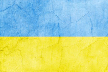 Flag of Ukraine painted on a concrete broken wall. Crisis in international relations, Russian military invasion of Ukraineの写真素材