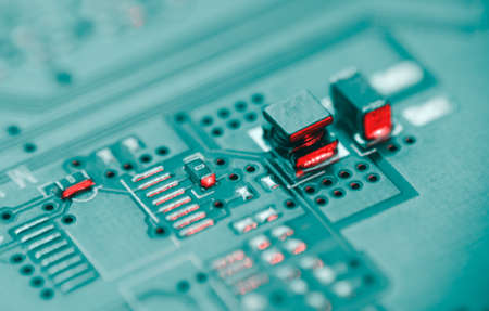 Computer Microchips and Processors on Electronic circuit board. computer hardware technology. Abstract technology microelectronics concept background. Macro shot, shallow focus.の写真素材