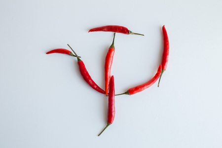 red chilli peppers in the form of Soviet symbols - hammer and sickle