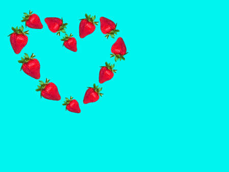 Seamless background with fresh strawberries. Juicy strawberries isolated on a green background. Pop...