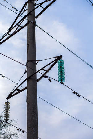 High voltage post. High-voltage power lines. Electricity distribution station.の写真素材