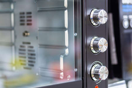 Microwave electric temperature switches close-up on a blurred background.