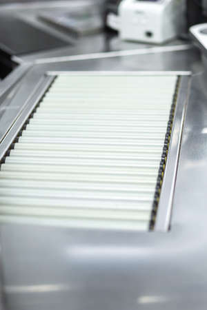 automatic conveyor for products at the checkout close-up