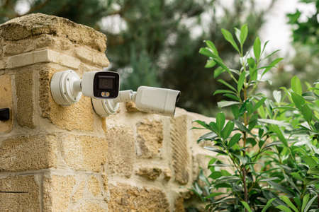 Futuristic security cameras scanning the street in 4K