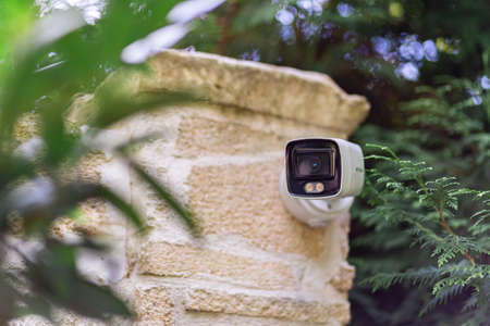 Futuristic security cameras scanning the street in 4Kの写真素材