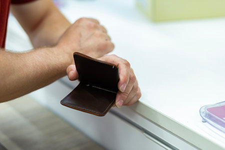 empty business card holder in male hands