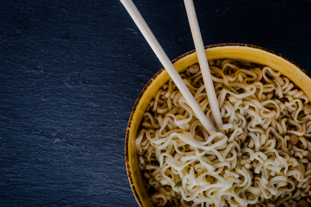 Instant noodles on black backgroundの写真素材