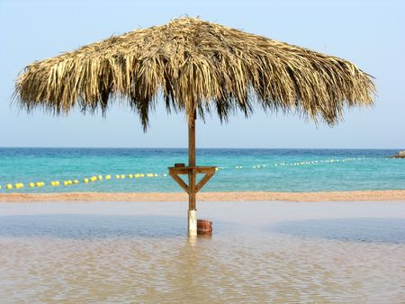 umbrella on seaの写真素材