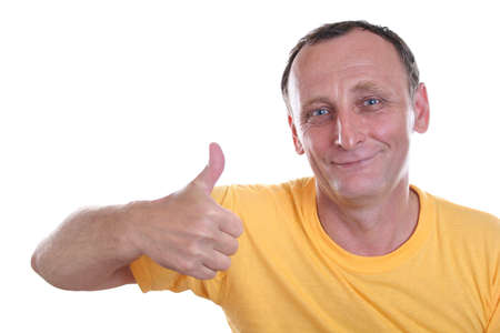 senior with finger OK