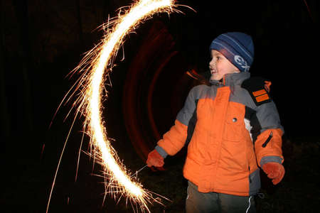 child with moving sparkler 2の写真素材