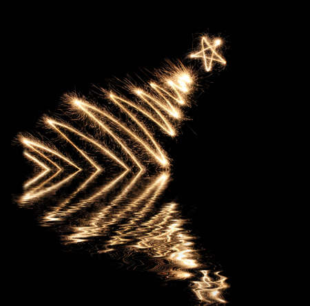 hot sparkler tree on waterの写真素材