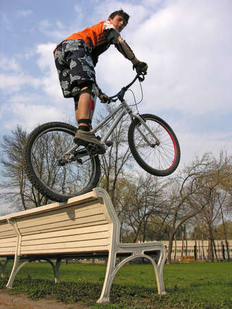 biker on benchの写真素材