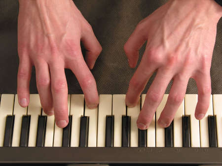hands on piano