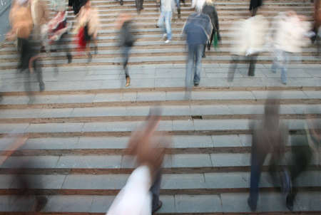 moving crowd on stair