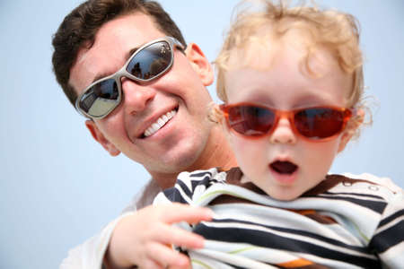 father with the child in the sunglassesの写真素材