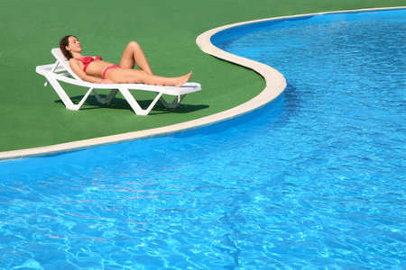 The woman has a rest about pool
